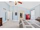 Bright main bedroom with walk-in closet, ensuite bathroom access, and contemporary paint at 2209 Lupine Pl, Erie, CO 80516
