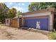 Garage with whimsical dog mural at 3102 N Columbine St, Denver, CO 80205