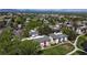 Scenic aerial view of charming apartment buildings surrounded by lush greenery and trees at 12120 Melody Dr # 308, Westminster, CO 80234