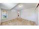 The bedroom has neutral carpet, closet and window for natural light at 12120 Melody Dr # 308, Westminster, CO 80234