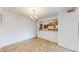Bright dining area featuring a chandelier and open access to the kitchen at 12120 Melody Dr # 308, Westminster, CO 80234