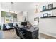 Modern office with high ceilings, floating shelves, and great natural light at 8864 S Field Ct, Littleton, CO 80128