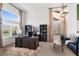Bright office space with large windows, high ceilings, and elegant furnishings at 8864 S Field Ct, Littleton, CO 80128