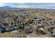 Wide aerial view of the neighborhood with mountain views in the background at 2575 S Independence Ct, Lakewood, CO 80227