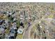 Aerial view of the neighborhood, showcasing homes and landscape at 2575 S Independence Ct, Lakewood, CO 80227