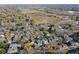 Aerial view of neighborhood with a wide open field nearby at 2575 S Independence Ct, Lakewood, CO 80227