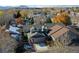 Aerial view of home in neighborhood with mountain views in the background at 2575 S Independence Ct, Lakewood, CO 80227