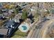 An aerial view showcasing the property's location and a kidney-shaped pool at 2575 S Independence Ct, Lakewood, CO 80227