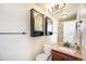 Clean bathroom with shower stall, vanity, and medicine cabinet at 2575 S Independence Ct, Lakewood, CO 80227