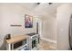 Well-appointed kitchen features modern appliances and bright lighting at 2564 S Acoma St, Denver, CO 80223