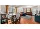 Inviting living room featuring hardwood floors and lots of natural light at 2564 S Acoma St, Denver, CO 80223