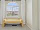 Window in the bedroom provides natural light and view with comfortable yellow chair at 18173 E Saskatoon Pl, Parker, CO 80134