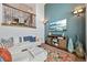 Cozy living room featuring comfortable seating, natural light, and stylish decor at 18173 E Saskatoon Pl, Parker, CO 80134