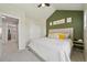 Spacious bedroom features an accent wall, closets, and access to a bathroom and laundry room at 18173 E Saskatoon Pl, Parker, CO 80134