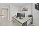 Office space featuring a desk with storage cabinets and a window at 18173 E Saskatoon Pl, Parker, CO 80134