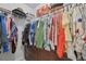 Organized walk-in closet with clothes hanging, shelving, and drawers to maximize storage space at 18173 E Saskatoon Pl, Parker, CO 80134