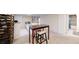 Basement area with a wine rack, small stools, and wet bar at 1823 S Carr St, Lakewood, CO 80232