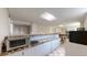 View of the basement bar area with countertop appliances at 1823 S Carr St, Lakewood, CO 80232