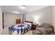 Finished basement bedroom with paneled walls and a window at 1823 S Carr St, Lakewood, CO 80232