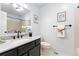 Stylish bathroom features a white sink, black faucet and framed nautical wall decor at 10836 W Evans Ave # 29, Lakewood, CO 80227