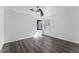 Bright bedroom features hardwood flooring, ample sunlight, and a minimalist design at 10836 W Evans Ave # 29, Lakewood, CO 80227