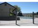 Fenced in pool area with views of the mountains in the distance at 10836 W Evans Ave # 29, Lakewood, CO 80227
