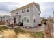 Spacious backyard with a patio area, perfect for outdoor dining and entertaining, in a fenced area at 2033 E 167Th Way, Thornton, CO 80602