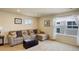 Cozy second living room with carpet and a window at 2033 E 167Th Way, Thornton, CO 80602