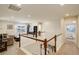 Loft area with seating and views of the living room and bedroom at 2033 E 167Th Way, Thornton, CO 80602