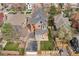Aerial view of a well-manicured property, showcasing the home's layout, yard, and surrounding neighborhood at 131 N Sherman St, Denver, CO 80203