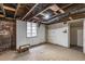 Unfinished basement with a small window, perfect for storage and future renovation at 131 N Sherman St, Denver, CO 80203