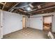 Unfinished basement featuring exposed ceiling and flooring, presents renovation opportunities and potential at 131 N Sherman St, Denver, CO 80203