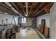 Unfinished basement with exposed ceiling and ductwork offering potential for customization and expansion at 131 N Sherman St, Denver, CO 80203