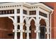 Charming front porch with ornate white columns and railings, offering a welcoming entry to the historic home at 131 N Sherman St, Denver, CO 80203