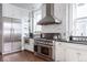 Spacious kitchen featuring stainless steel appliances, custom cabinets, and a modern aesthetic at 131 N Sherman St, Denver, CO 80203