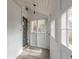 Bright and airy sunroom with white paneled walls, wood floors, and large windows offering a charming space at 131 N Sherman St, Denver, CO 80203
