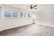 Bedroom featuring large windows, and hardwood floors at 2314 S Troy St, Aurora, CO 80014