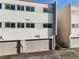 Townhouse exteriors featuring two-car garages and upper-level windows, promoting natural light at 2314 S Troy St, Aurora, CO 80014