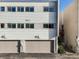 Townhouse exteriors featuring two-car garages and upper-level windows, promoting natural light at 2314 S Troy St, Aurora, CO 80014