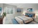 Spacious bedroom with a plush bed and ample natural light at 4238 S Netherland Cir, Aurora, CO 80013