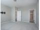 Spacious bedroom with carpet, large closet, and access to bathroom at 4238 S Netherland Cir, Aurora, CO 80013