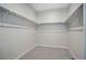 Large walk-in closet with double hanging rods and shelving at 4238 S Netherland Cir, Aurora, CO 80013