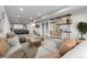 Open basement features a home theater area and lounge space at 18815 W 93Rd Ave, Arvada, CO 80007