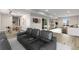 Finished basement with home theater, dining area, and sliding glass doors at 18815 W 93Rd Ave, Arvada, CO 80007