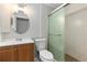Modern bathroom featuring glass shower stall with modern tiles at 18815 W 93Rd Ave, Arvada, CO 80007