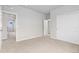 A bedroom with a walk-in closet and ensuite bathroom at 18815 W 93Rd Ave, Arvada, CO 80007
