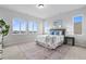 Bedroom showcasing mountain views from its multiple windows at 18815 W 93Rd Ave, Arvada, CO 80007