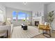 Living room with bright windows and fireplace at 18815 W 93Rd Ave, Arvada, CO 80007