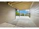 Covered patio features concrete flooring and views of the surrounding area at 18815 W 93Rd Ave, Arvada, CO 80007