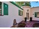Charming home with a brick entrance and green trim at 1275 Birch St, Denver, CO 80220